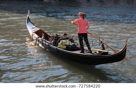 Similar – Image, Stock Photo A gondolier in his gondola on the Grand Canal in Venice