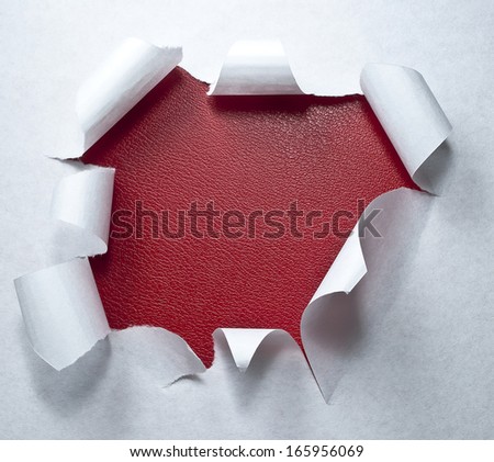 red leather  circle shape breakthrough paper hole with white background
