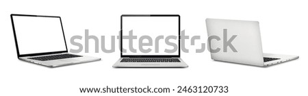 Laptop computer with white screen, front and rear view
