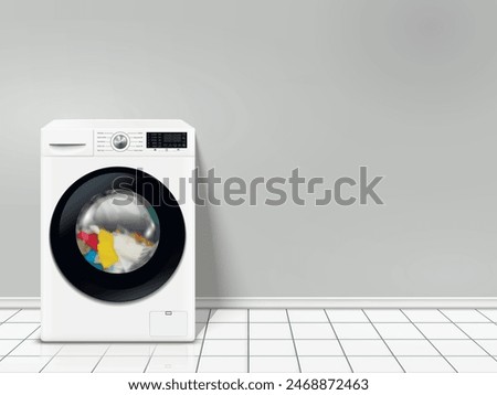 Modern washing machine in empty laundry room