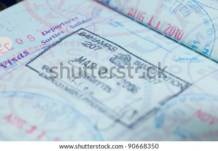 Macro image of visa and immigration stamps in US passport for Bahamas