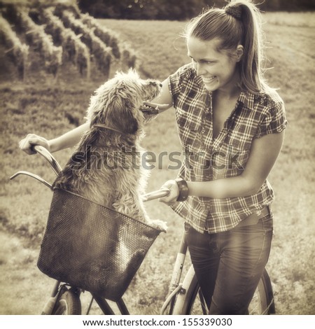 Friendship / Vintage style photo from a girl and her dog