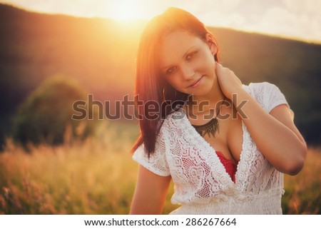 Attractive women / Sexy young women in the sunset, with custom white balance and color filters,