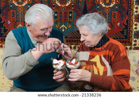 joy couple feeding tasty dessert