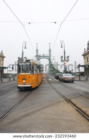 Budapest, Hungary - January 3, 2014: No 47 tram passing by Budapest. Old yellow tram in Budapest, Hungary.