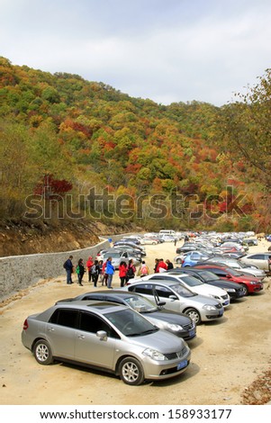 BENXI - OCTOBER 4: Many cars parked in parking of a scenic spot on October 4, 2013, Benxi city, Liaoning province, China