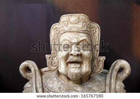 Chinese traditional style religious figure stone works, closeup of photo