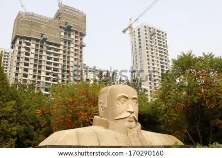 TANGSHAN - OCTOBER 18: The statue of Mr Li dazhao, the founders of communist party of China in the DaZhao Park, on october 18, 2013, tangshan city, hebei province, China.