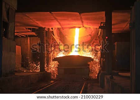 TANGSHAN - JUNE 18: converter dumping steel slag in iron and steel co., on June 18, 2014, Tangshan city, Hebei Province, China