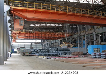 TANGSHAN - JUNE 14: Steel mills continuous casting workshop transport steel ingot, on June 14, 2014, Tangshan city, Hebei Province, China