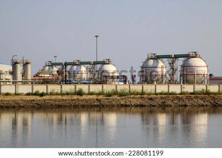 CAOFEIDIAN CITY - SEPTEMBER 27: China\'s oil storage tanks jidong oilfield company, on september 27, 2014, Caofeidian City, Hebei Province, China