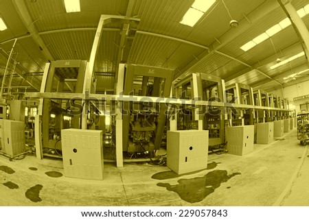 LUANNAN COUNTY - JANUARY 5: The molding workshop machinery and equipment in a warehouse, in the ZhongTong Ceramics Co., Ltd. January 5, 2014, Luannan county, Hebei Province, China.