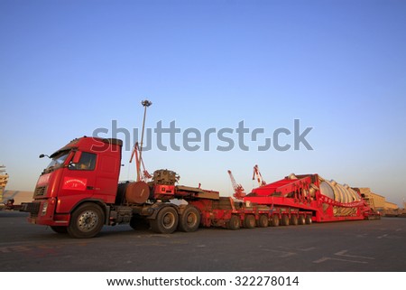 TIANJIN PORT - MARCH 22: a multi-axis heavy-duty truck parked in the terminal yard, on March 22, 2015, tianjin port, tianjin, China.