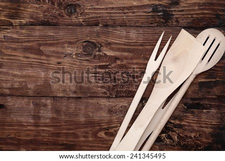 wooden background, menu board and kitchenware