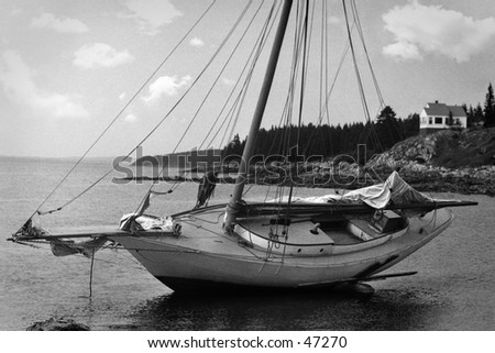 Retro restored photo from a 1920\'s negative\
\
of a beached boat