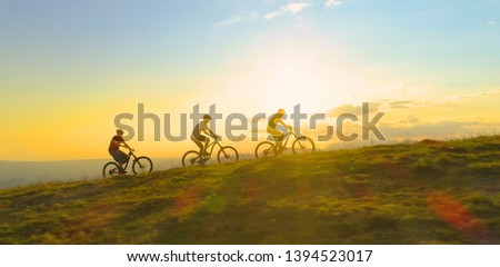 Similar – Image, Stock Photo The three riders and their dogs return after work