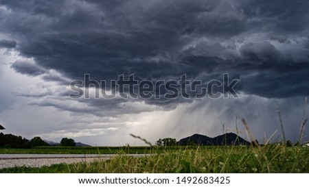 Similar – Foto Bild Grauer Himmel, Bäume, Feld