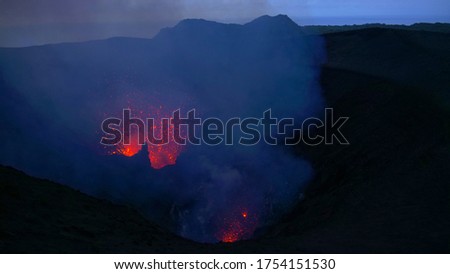 Similar – Image, Stock Photo Bright orange lava emitting out of volcano at night
