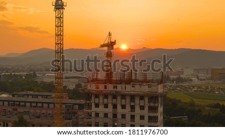 Similar – Image, Stock Photo Two multistory buildings standing face to face.