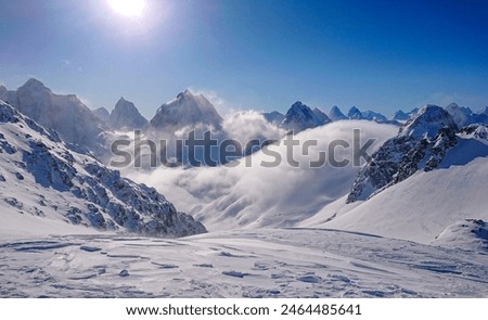 Similar – Foto Bild Schneebedeckte Bergspitze