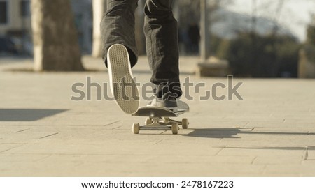 Similar – Image, Stock Photo Unrecognizable man with skateboard and backpack in city