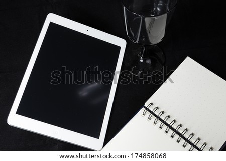 computer tablet with blank note book