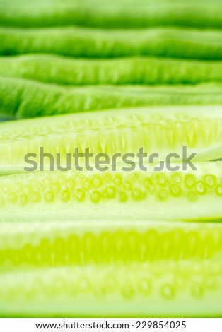 Cucumber and yard long bean vegetable in concept of healthy food background