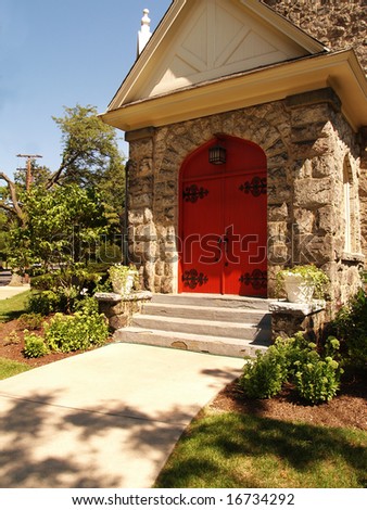 two red church doors for a country church