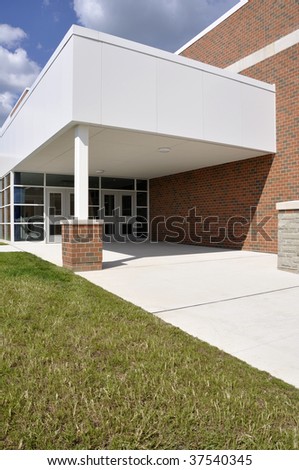 entry doors and sidewalk by a new school