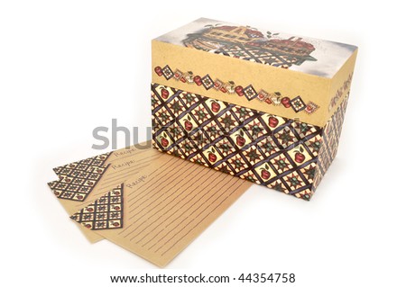 Recipe box and three recipe cards isolated on a white background