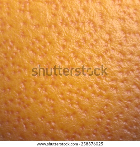 Orange skin texture background.