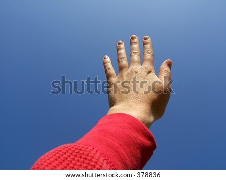 hand reaching to the sky