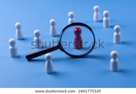 Similar – Image, Stock Photo wooden figures of men stand on a beige background and a red plastic magnifying glass. Recruitment concept, search for talented and capable employees, career growth