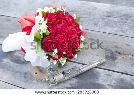 Old gun and roses