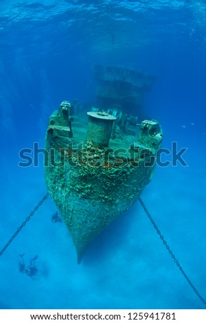 The USS Kittewake, a former submarine rescue vessel, was sunk in early 2011 in Grand Cayman to become an artificial reef and scuba diving attraction.