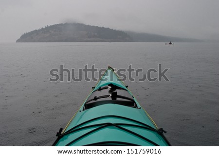 One can kayak from campsite to campsite in the San Juan Islands in the Pacific Northwest.  This area is gorgeous and completely unspoiled.