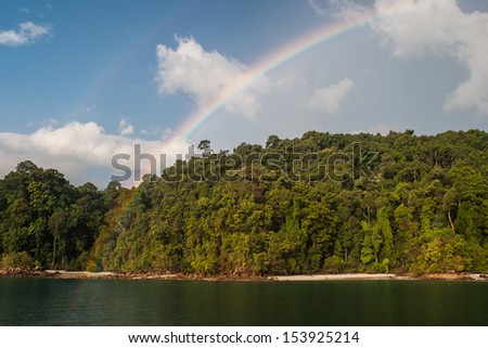 A rainbow appears near a remote island in the Mergui Archipelago in Myanmar. This remote set of hot, humid islands is rarely visited and is home to the Moken, a group of sea gypsies.