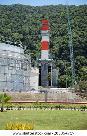 MAY 28, 2015 : KHANORM, THAILAND. Construction of gas combine cycle power plant with cooling water piping system in Khanorm province, southern region of Thailand.