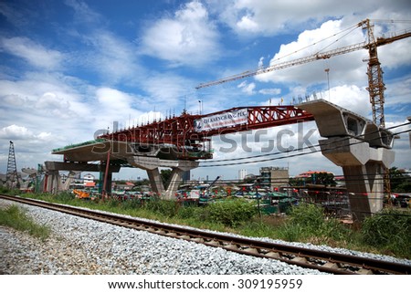 AUGUST 9, 2015 ; NONTHABURI - THAILAND : Detail construction of Concrete bridge across Chaopraya river under-construction of its foundation, road surface and its supporting structure.