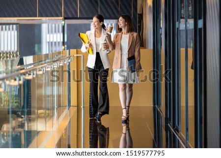 Similar – Image, Stock Photo Businesswoman with coffee cup on street