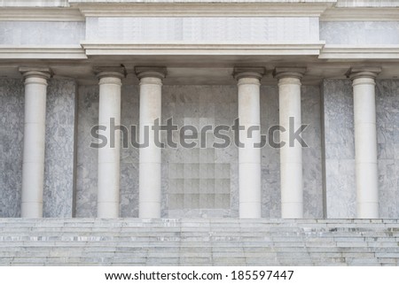 Stone steps and entry way with columns