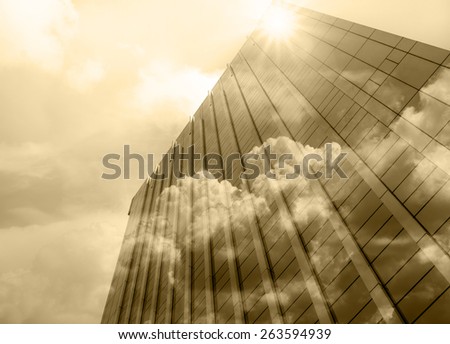Closeup building glass of skyscrapers with cloud, Business concept of architecture