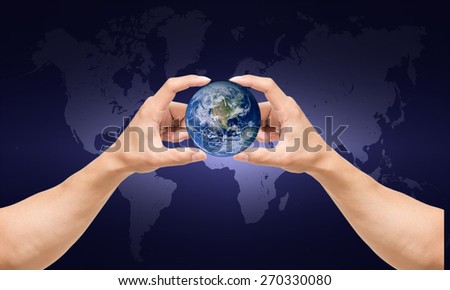 man hand catching the earth on world map, earth day, Elements of this image furnished by NASA