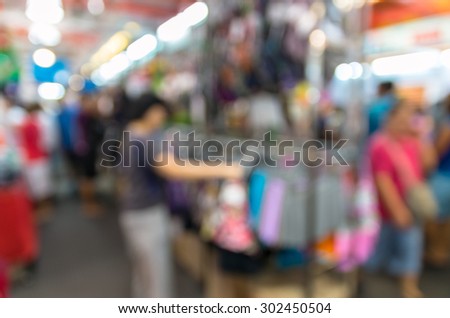 Abstract blurred photo of store blur with customer choose product bokeh background