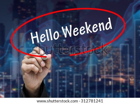 Man Hand writing Hello Weekend by black marker on visual screen. Business concept