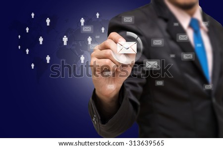 Businessman writing the mail with world map and people logo background, Elements of this image furnished by NASA