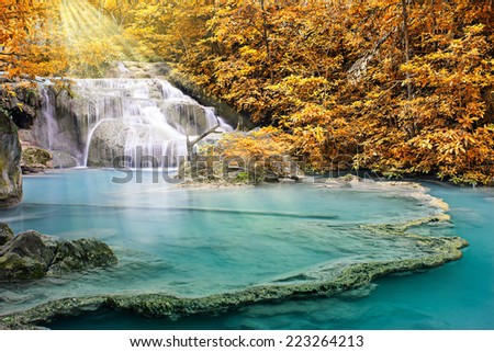 Beautiful waterfall with sunshine in deep forest