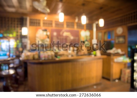 abstract blurred coffee shop with bokeh light, warm light tone