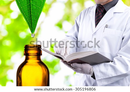 Doctor reading text book with water drop from green leaf to bottle