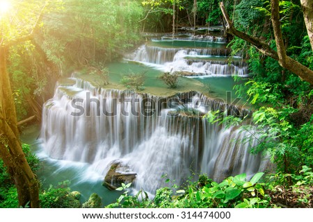 Hui Mae Khamin waterfall in tropical forest, Thailand